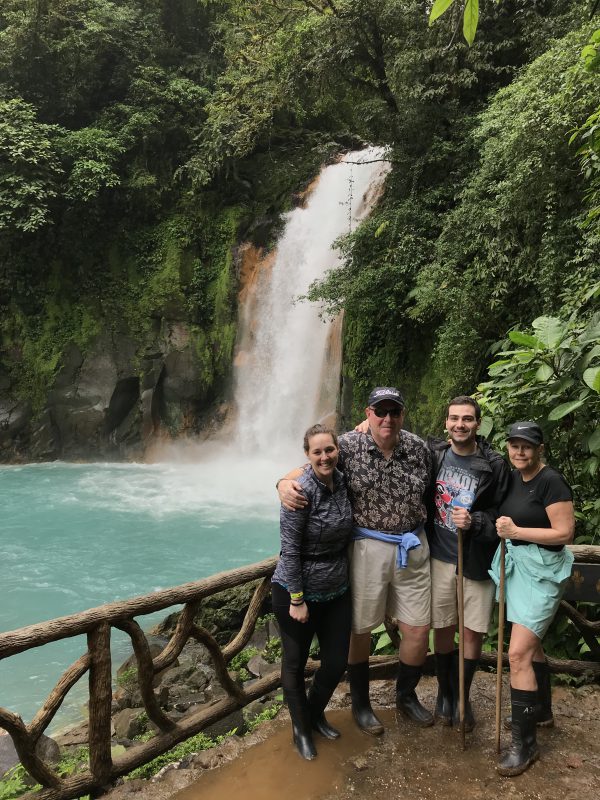 Family hike to waterfall in Costa Rica